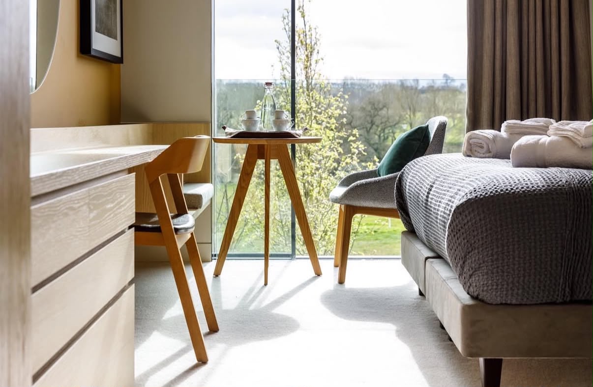 Airbnb bedroom with fresh towels ready for guests