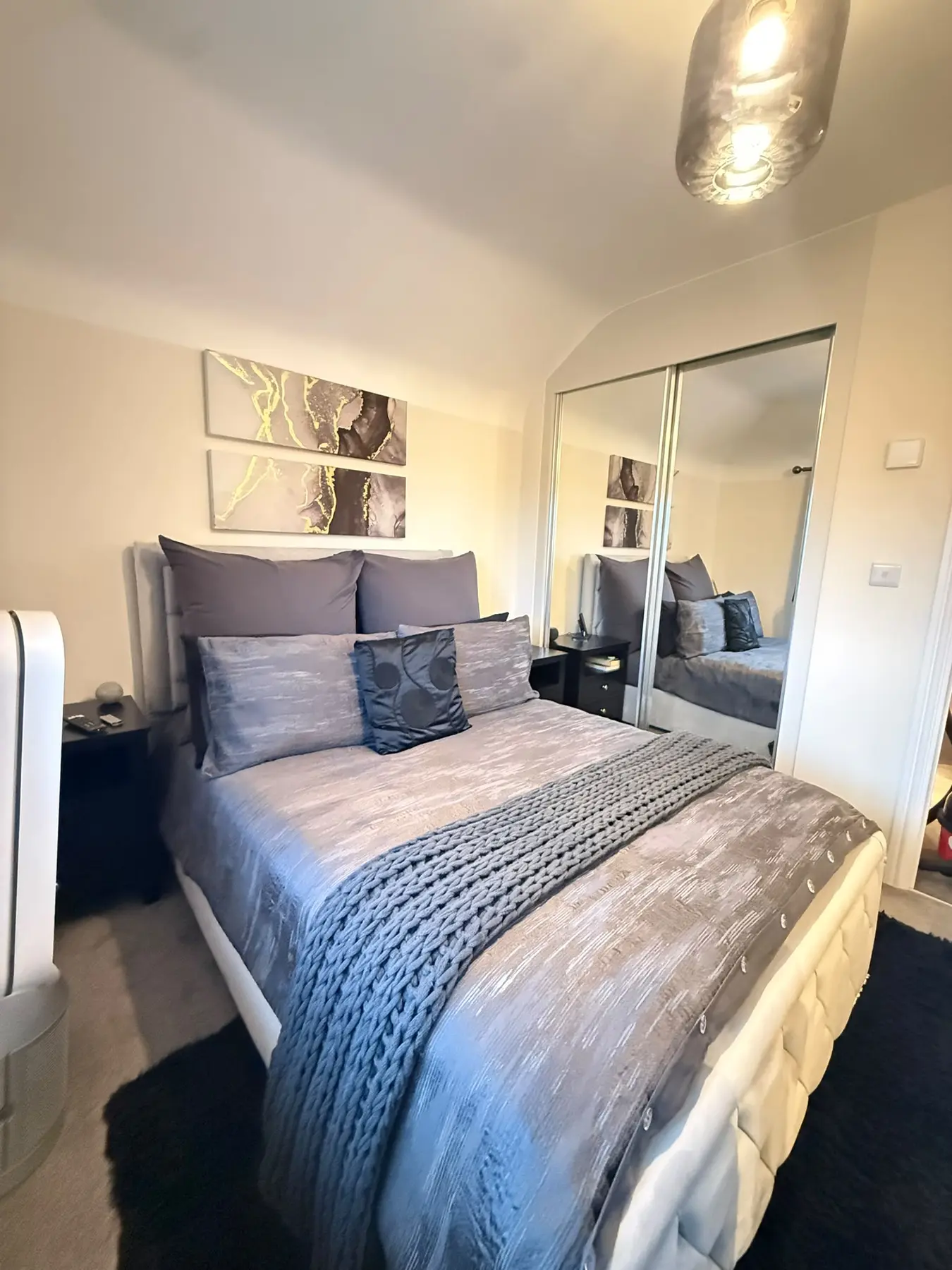 Grey bedroom prepared after cleaning