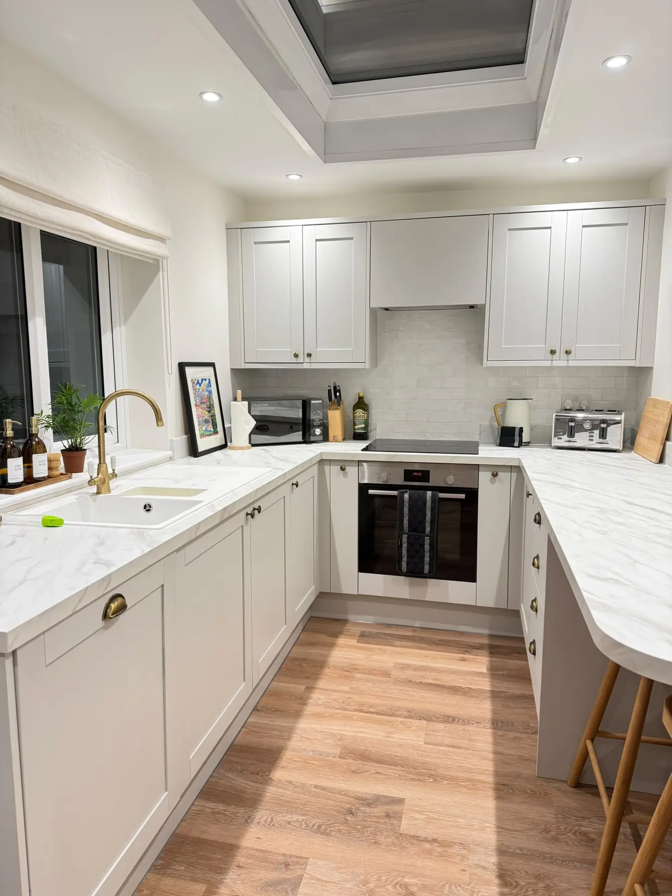 White fitted kitchen after cleaning