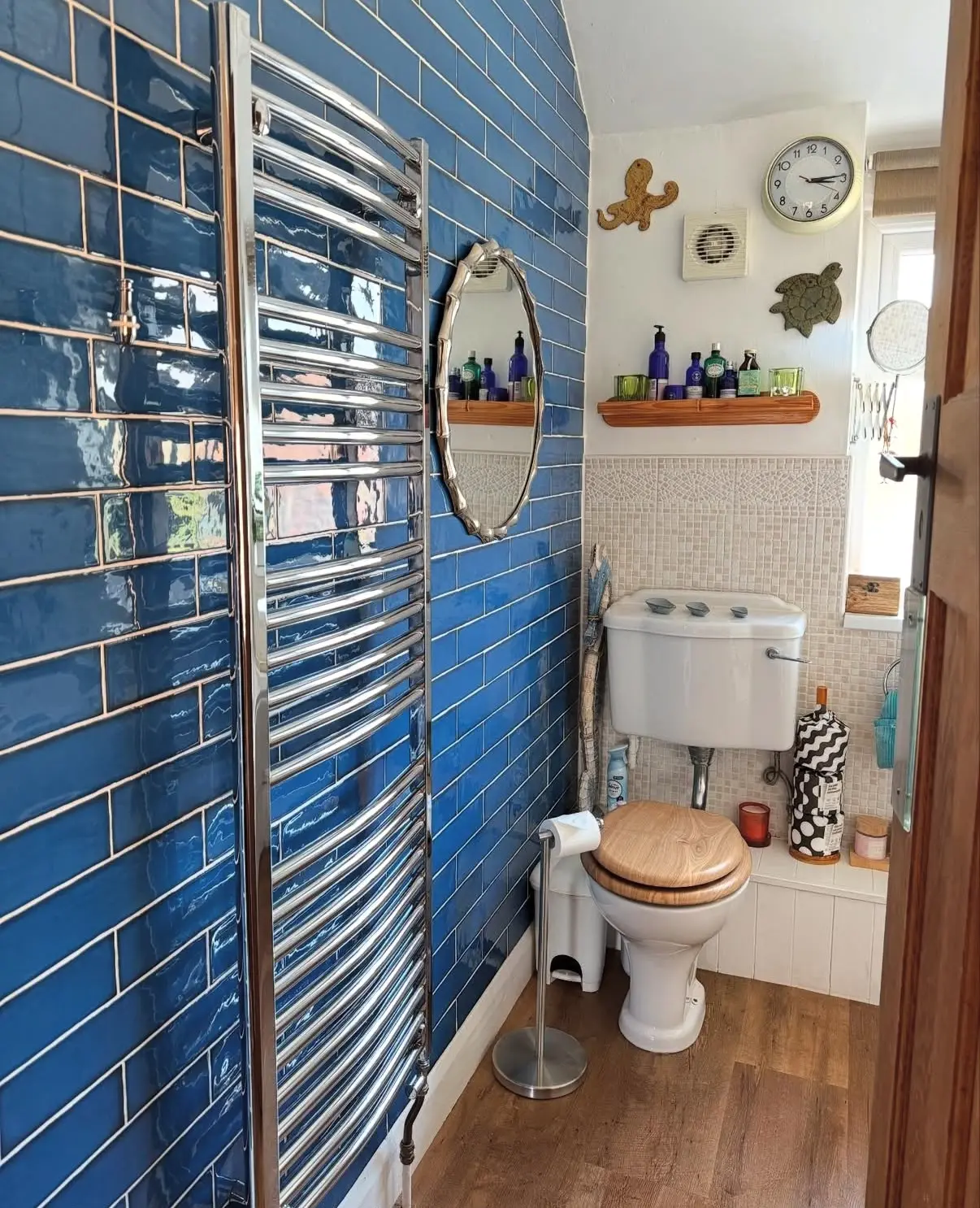 Blue tiled bathroom after cleaning